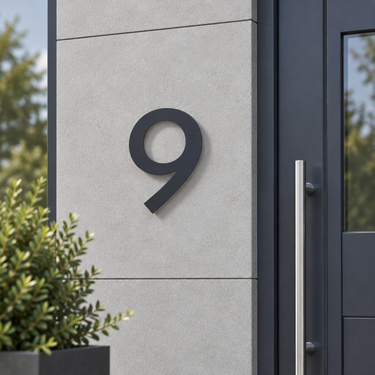 Număr de casă din inox, personalizat – Număr de casă Geometric „9” antracit pe peretele casei · MOHAVE